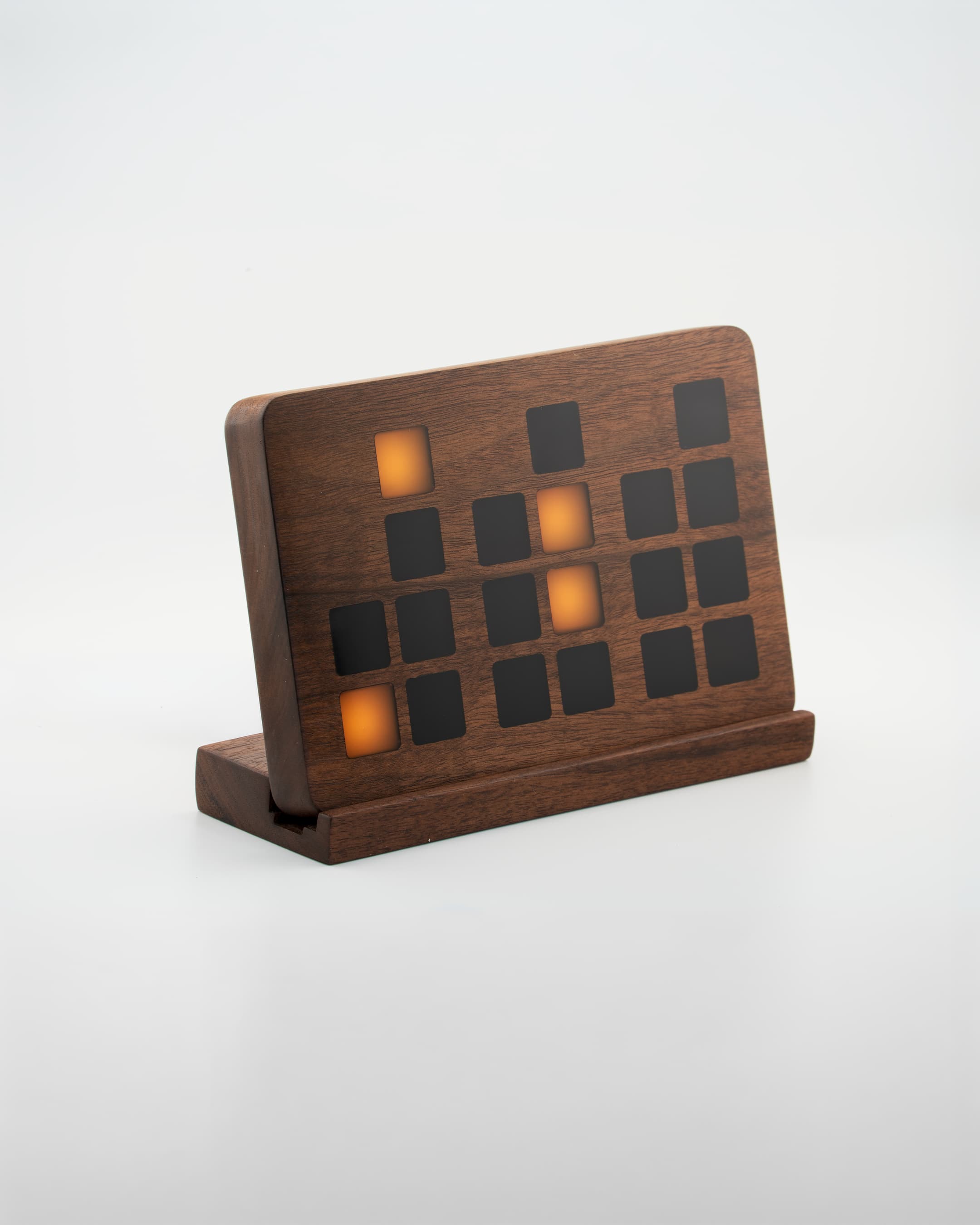 The Binesse binary clock — solid walnut, the first object from Binesse